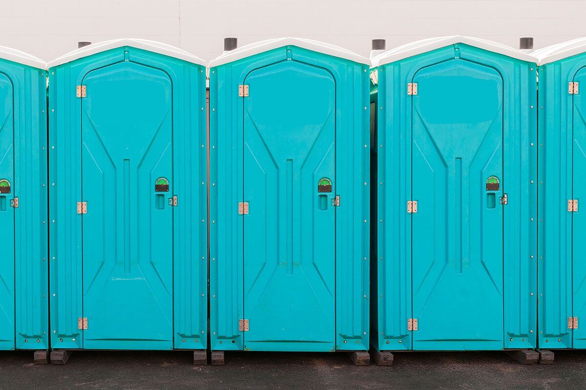 Industrial portable restroom units at a plant in Seguin, Texas